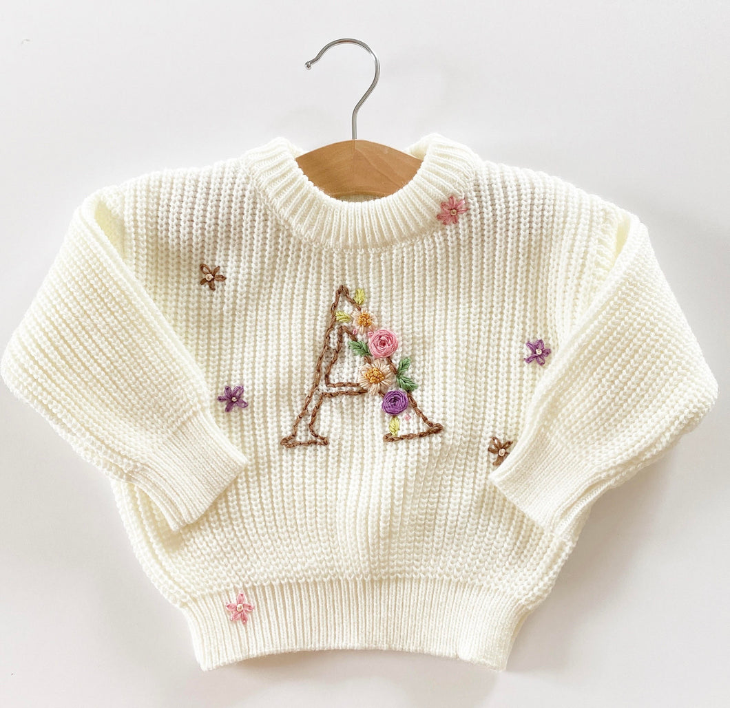 A embroidery floral sweater